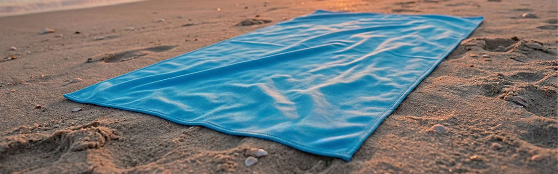 Ręcznik Dr.Bacty na plaży