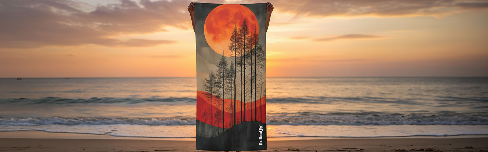 Ręcznik Dr.Bacty na plaży