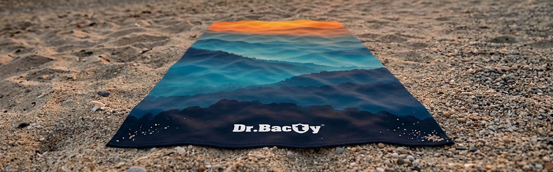 Ręcznik Dr.Bacty na plaży